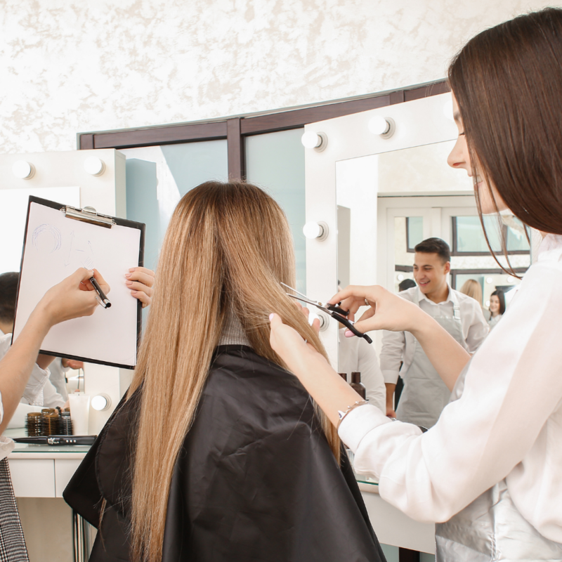 hair stylists coaching cutting hair